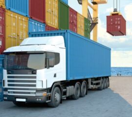 Road-truck-at-port-with-containers